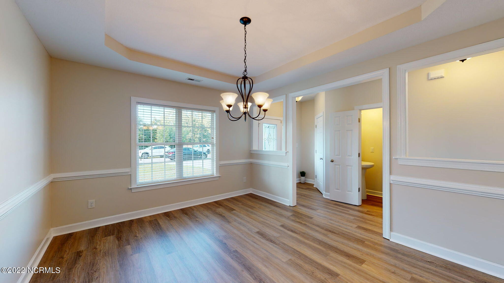 200 Bell Ridge Lane Hubert, NC 28539 - Photo 11 of 59 New LVP flooring throughout the downstairs to include the closets and bathroom.