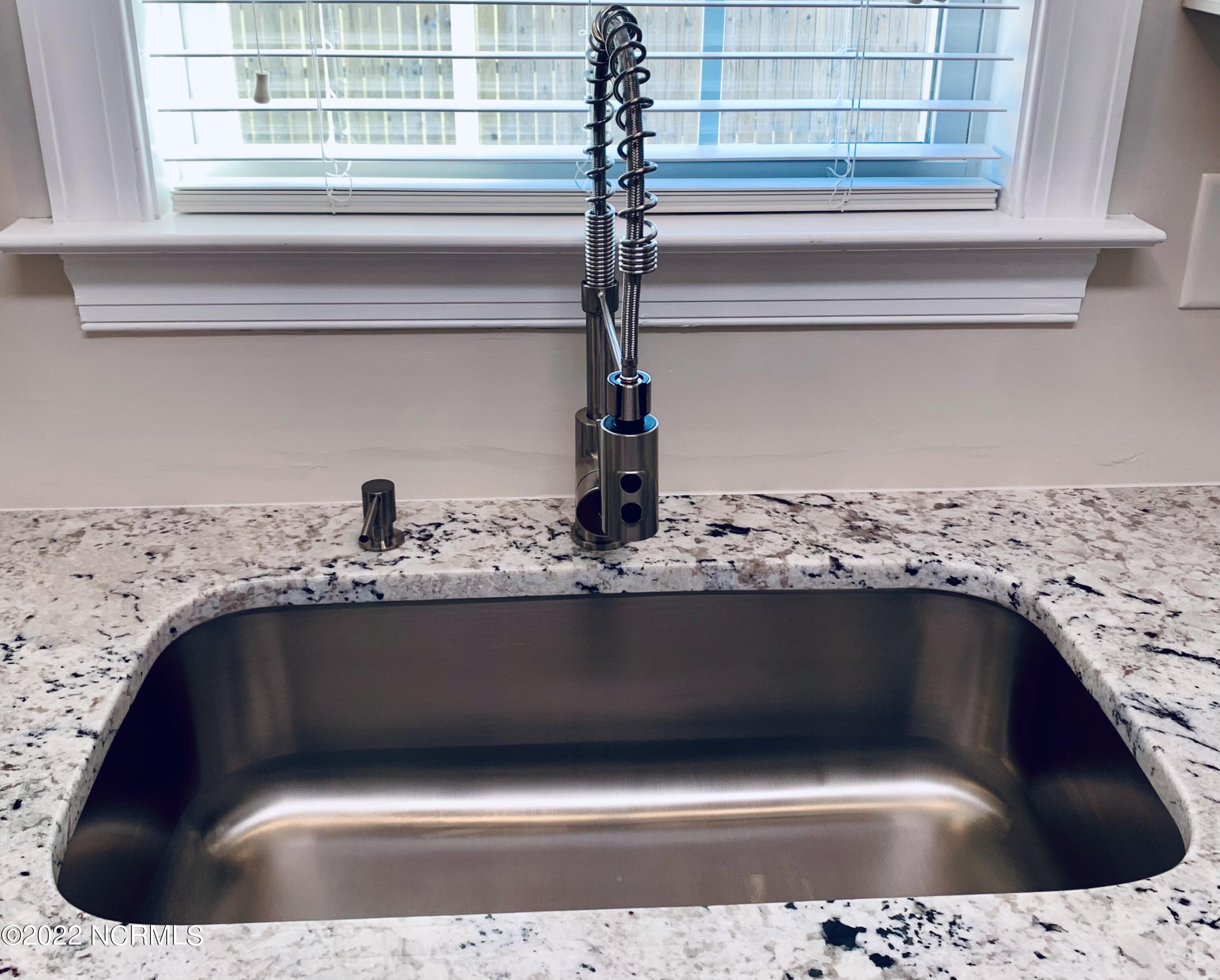200 Bell Ridge Lane Hubert, NC 28539 - Photo 16 of 59 Single basin undermount sink w/ a gorgeous faucet & bonus soap dispenser.