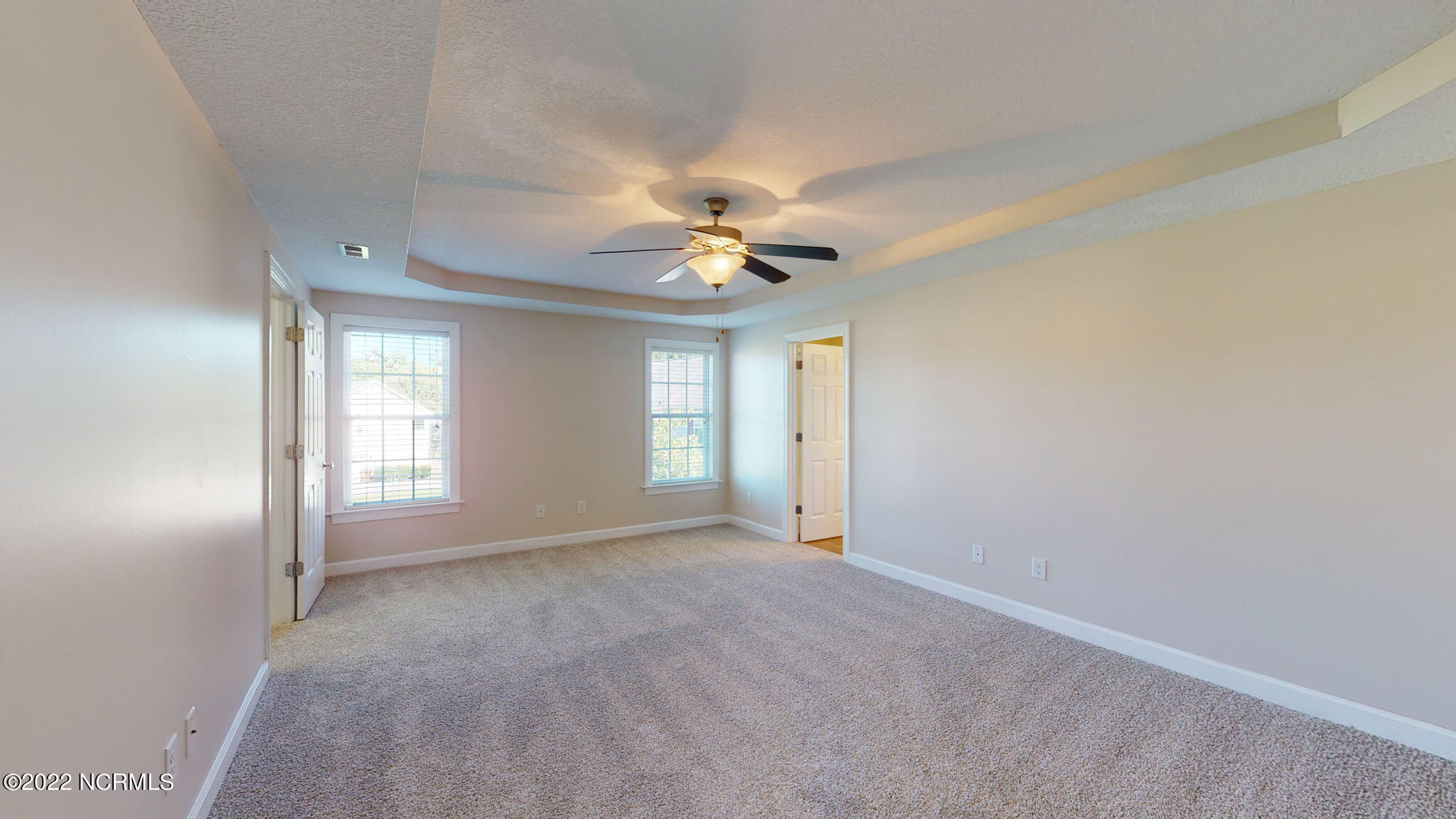 200 Bell Ridge Lane Hubert, NC 28539 - Photo 25 of 59 So much room, beautiful natural light w/ tray ceiling.