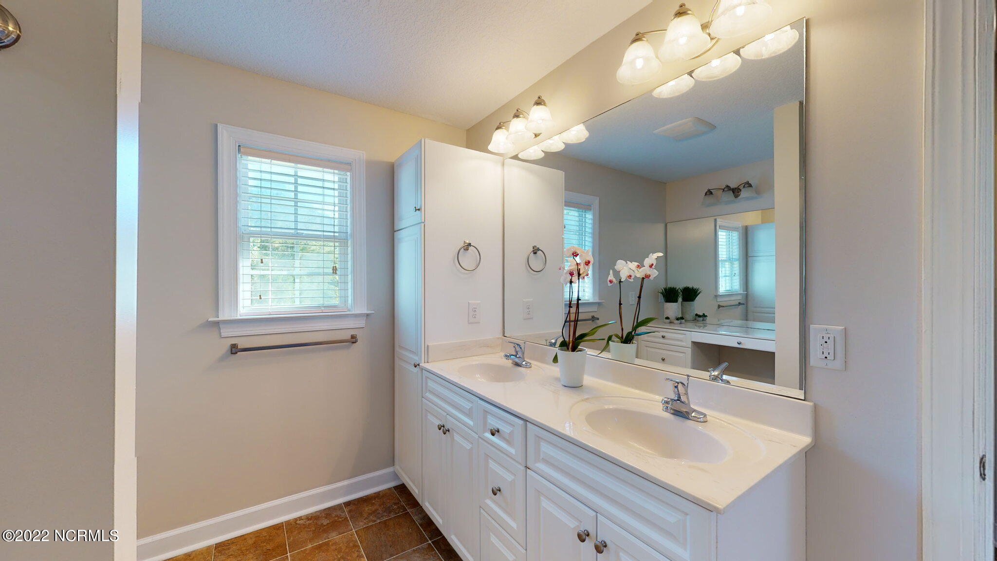 200 Bell Ridge Lane Hubert, NC 28539 - Photo 30 of 59 Dual vanity, and cabinet space to include a linen cabinet.