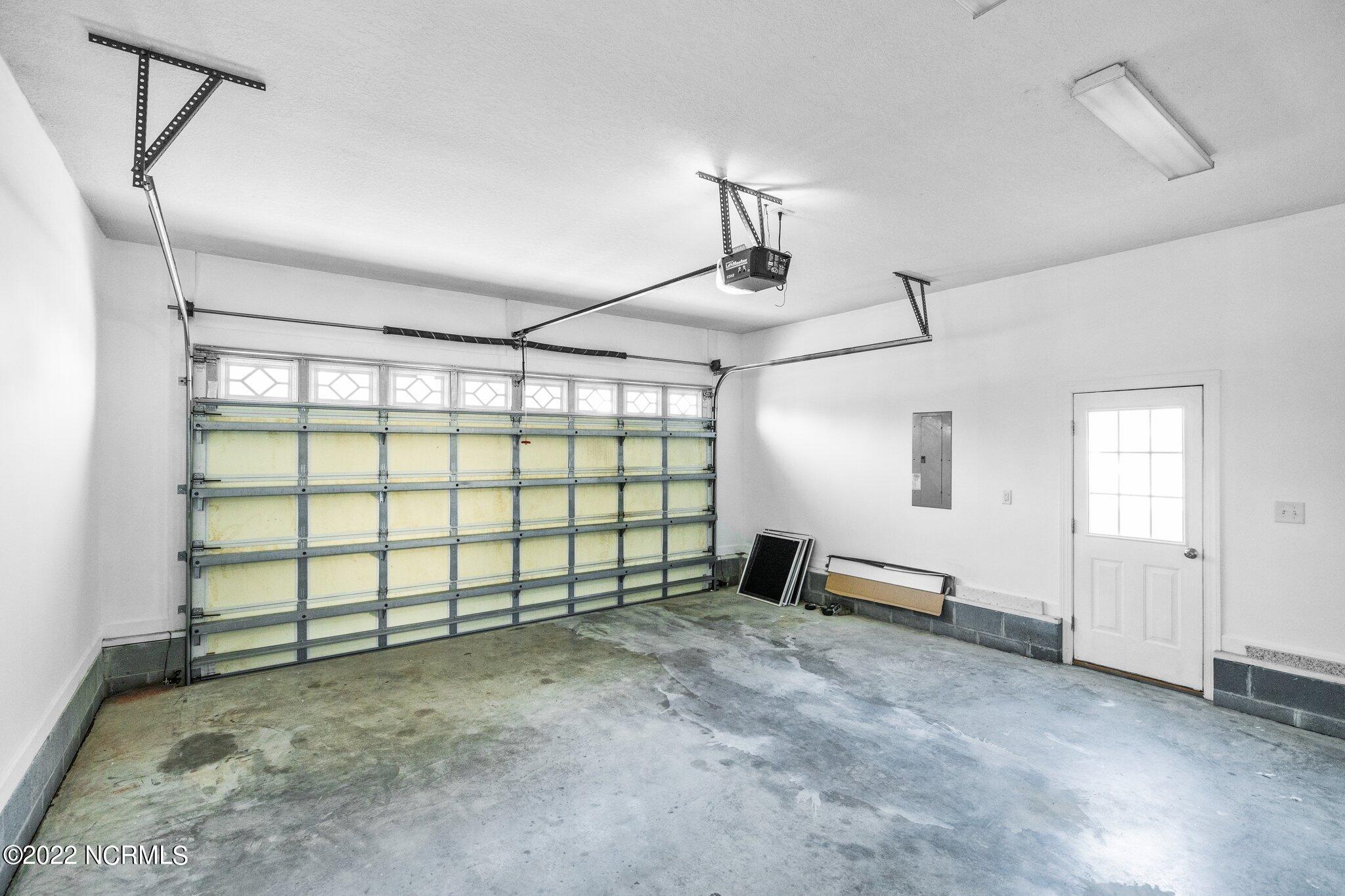200 Bell Ridge Lane Hubert, NC 28539 - Photo 42 of 59 2 Car garage. Garage walls have been freshly painted & floor pressure washed.