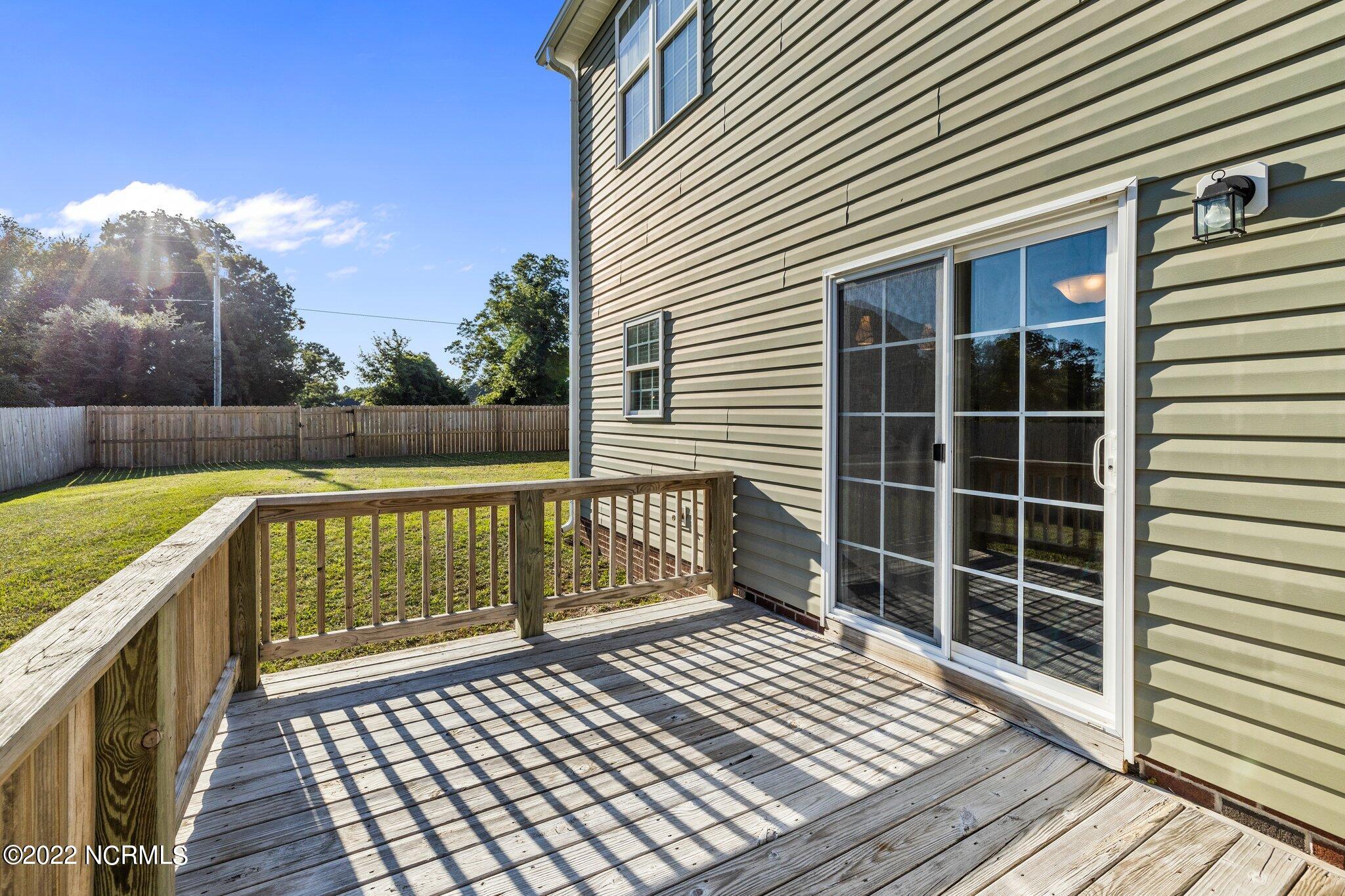 200 Bell Ridge Lane Hubert, NC 28539 - Photo 47 of 59 Freshly pressure washed. Single entry gate on right side of the yard.