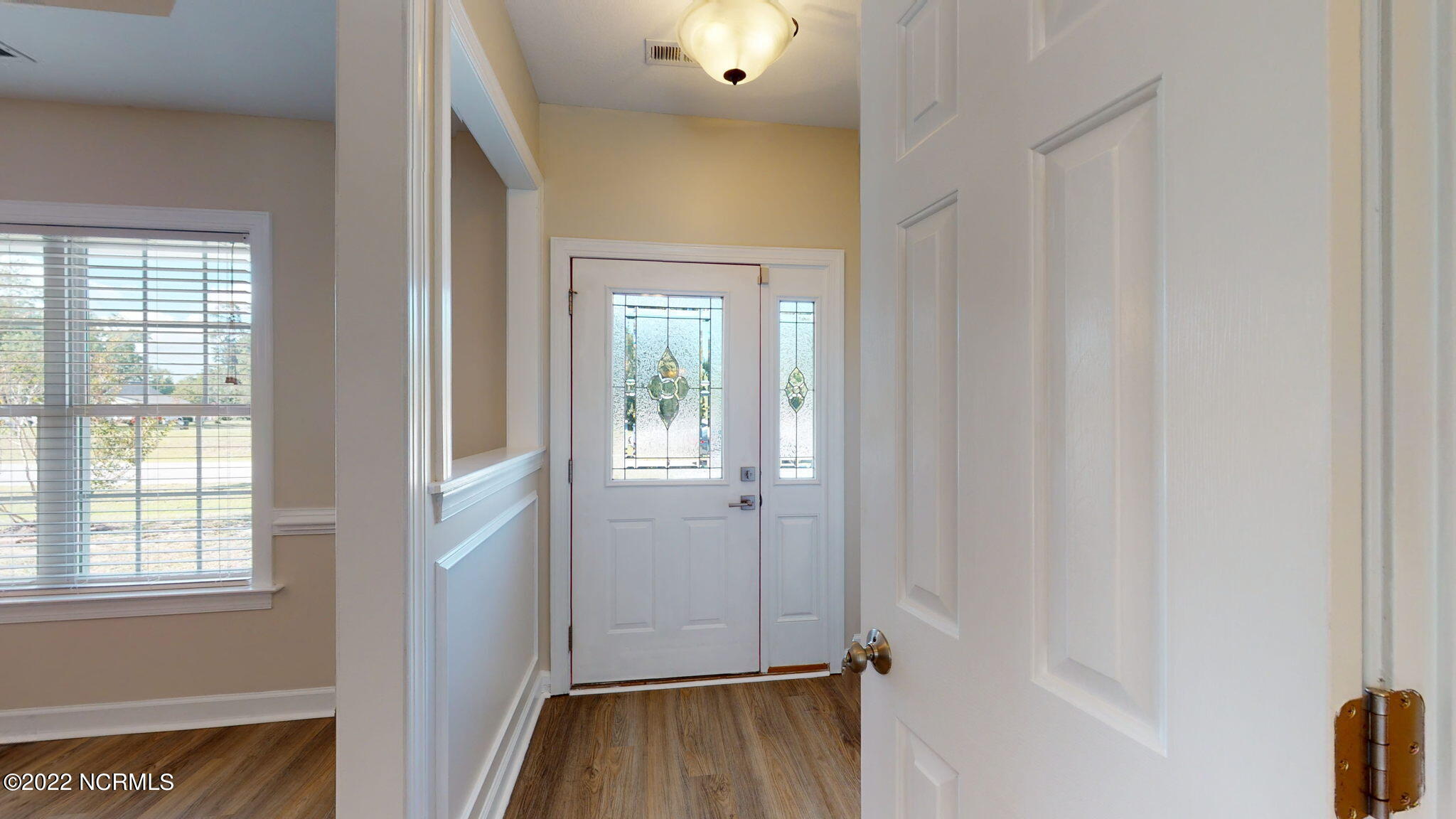 200 Bell Ridge Lane Hubert, NC 28539 - Photo 9 of 59 New LVP flooring throughout the downstairs to include closets and pantry & half bathroom.