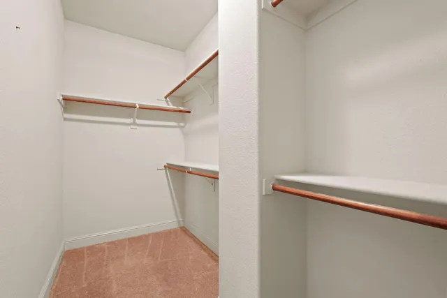 a backyard of a house with yard and outdoor seating