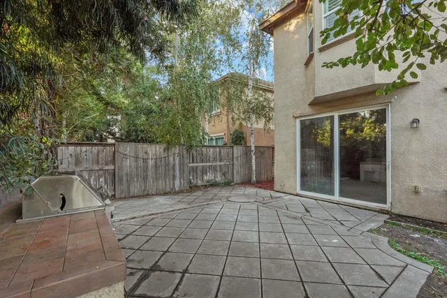 a view of backyard with green space