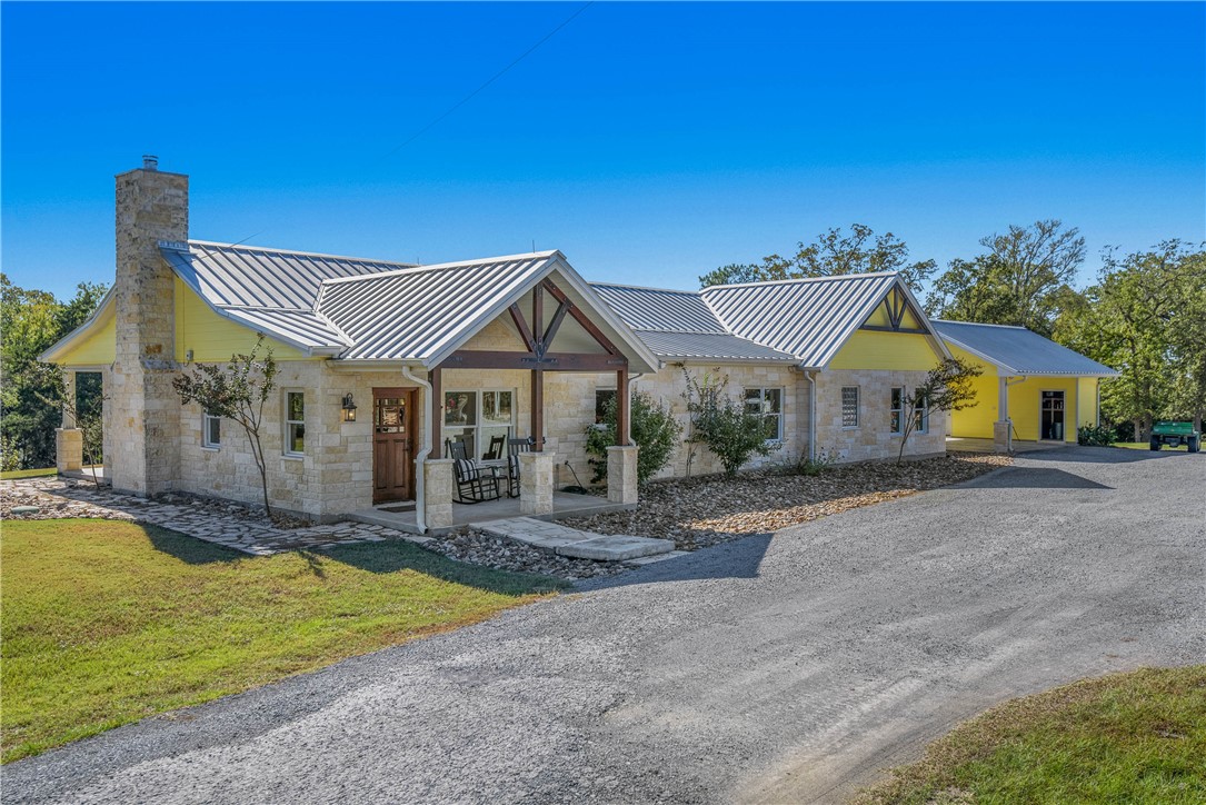 9285 John Rice Road Iola, TX 77861 - Photo 1 of 1 View of front of home featuring a porch and a fron