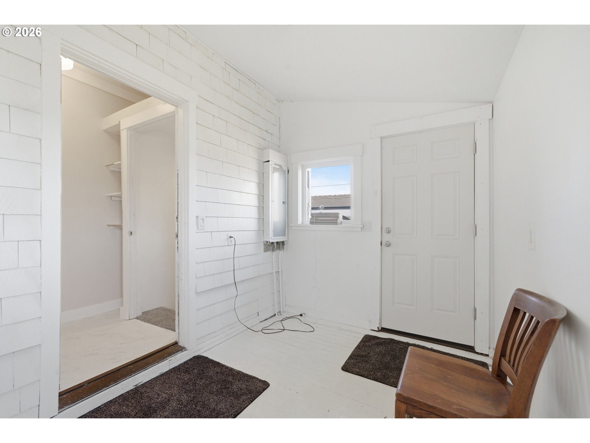 1802 8th Street Tillamook, OR 97141 - Photo 24 of 37 a view of an empty room and wooden floor