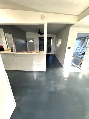 a view of a living room with entryway