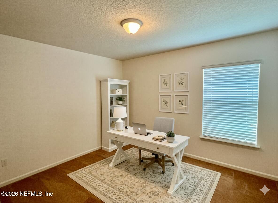 16264 Tisons Bluff Road Jacksonville, FL 32218 - Photo 21 of 36 a work room with furniture and a window