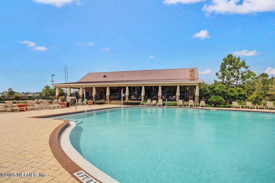 16264 Tisons Bluff Road Jacksonville, FL 32218 - Photo 29 of 36 a view of a house with swimming pool