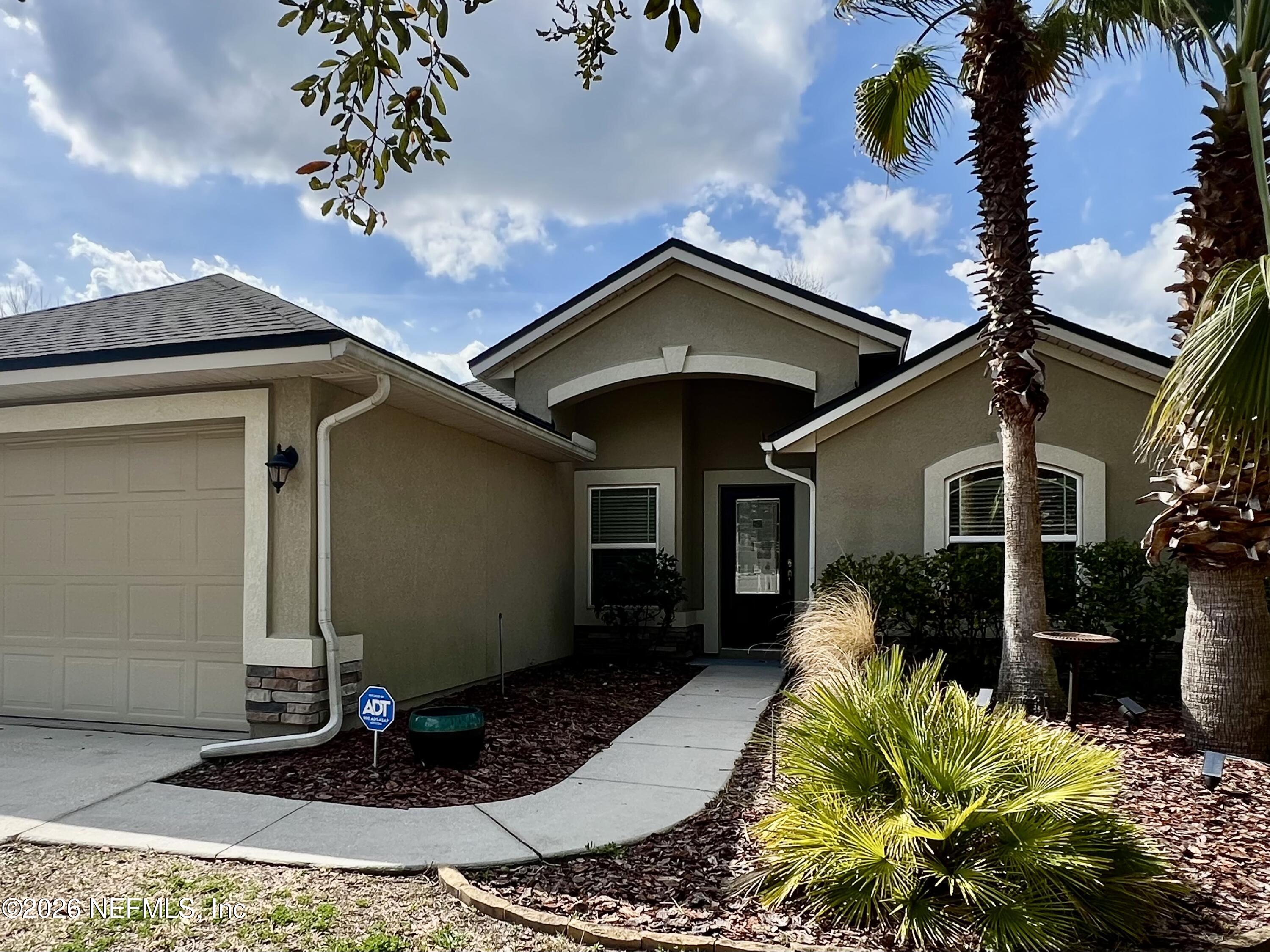 16264 Tisons Bluff Road Jacksonville, FL 32218 - Photo 3 of 36 a view of a house with a patio