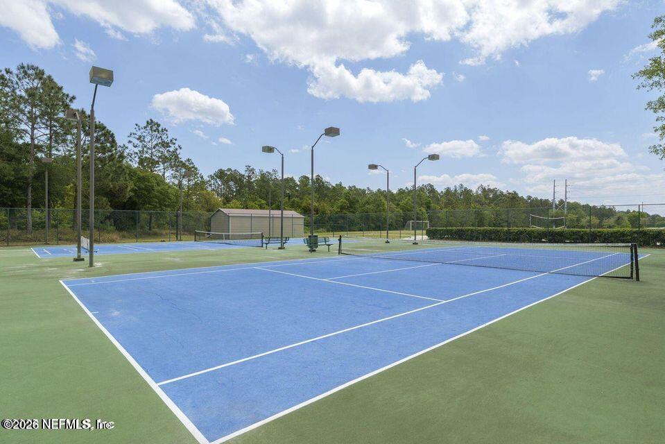 16264 Tisons Bluff Road Jacksonville, FL 32218 - Photo 35 of 36 a view of a tennis court