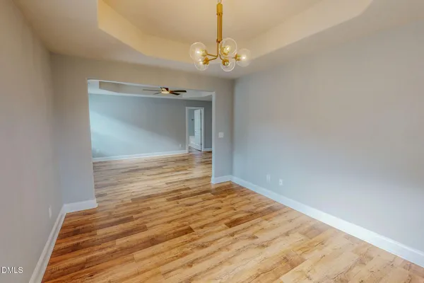 a spacious bathroom with a sink double vanity granite tub and shower