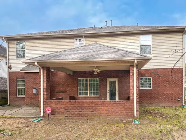 a front view of a house with a garage