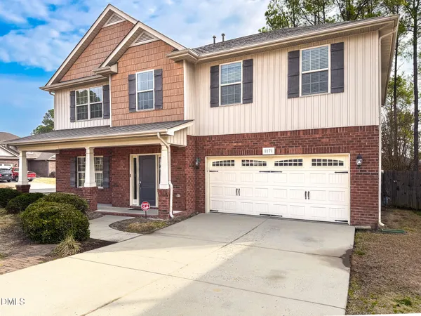 a kitchen with stainless steel appliances granite countertop a refrigerator sink and cabinets