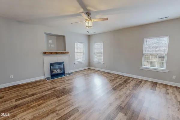 a kitchen with stainless steel appliances granite countertop a stove a sink dishwasher and a microwave