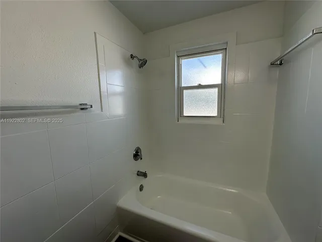 a bathroom with a bathtub