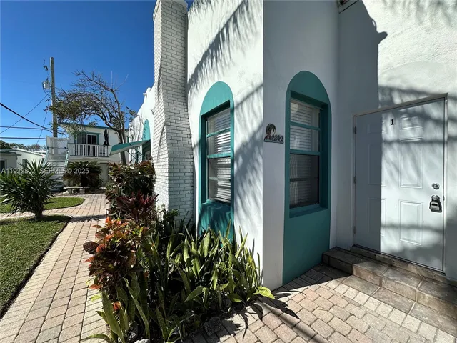 a view of a back yard of the house