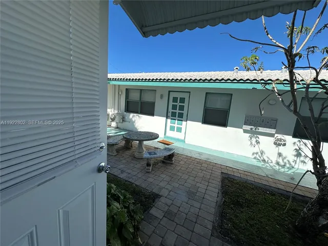 a view of a house with a patio