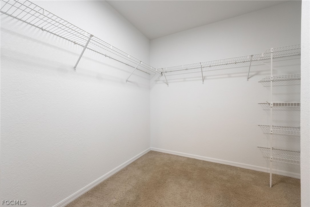 18890 Fox Run Road Alva, FL 33920 - Photo 19 of 50 a view of a room with racks on the wall
