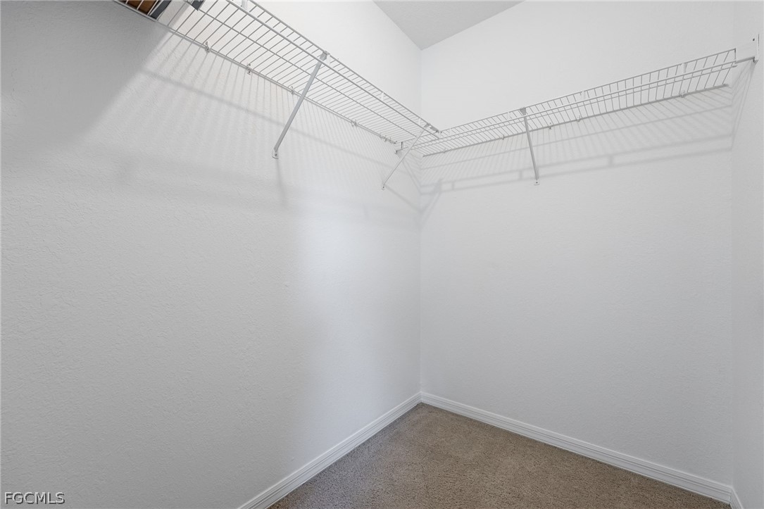 18890 Fox Run Road Alva, FL 33920 - Photo 21 of 50 a view of a room with racks on the wall