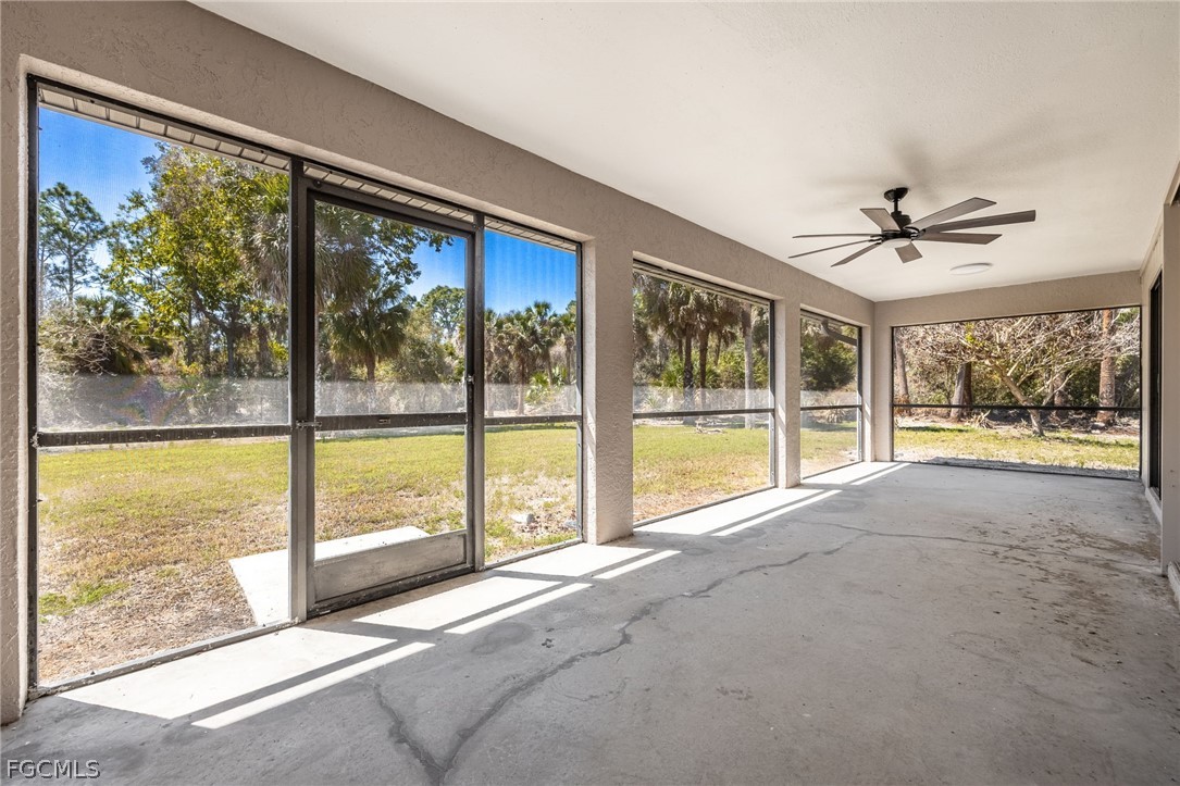 18890 Fox Run Road Alva, FL 33920 - Photo 27 of 50 a view of an empty room with a large window