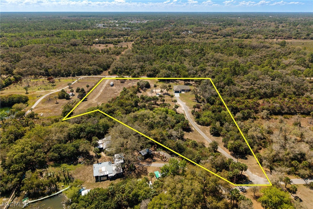 18890 Fox Run Road Alva, FL 33920 - Photo 43 of 50 an aerial view of house with yard