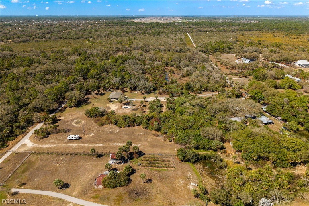 18890 Fox Run Road Alva, FL 33920 - Photo 46 of 50 an aerial view of residential houses with outdoor space