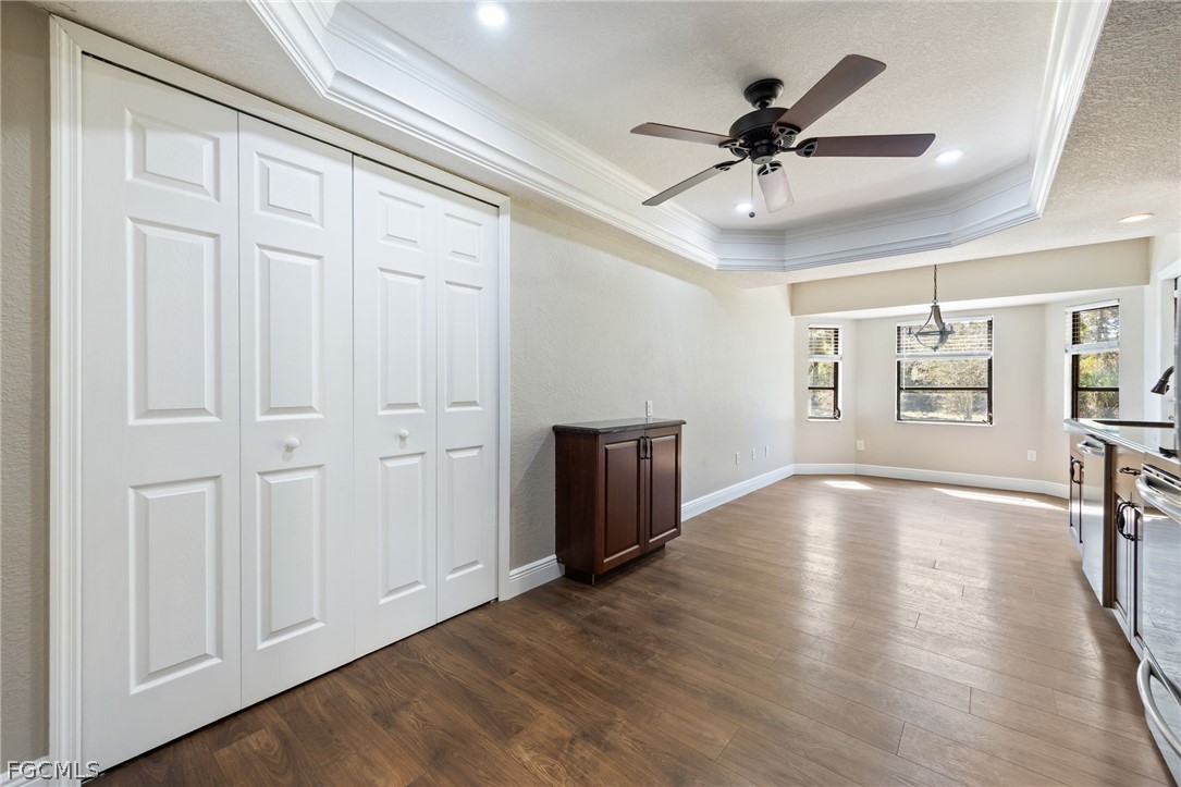 18890 Fox Run Road Alva, FL 33920 - Photo 10 of 50 wooden floor in an empty room with a window