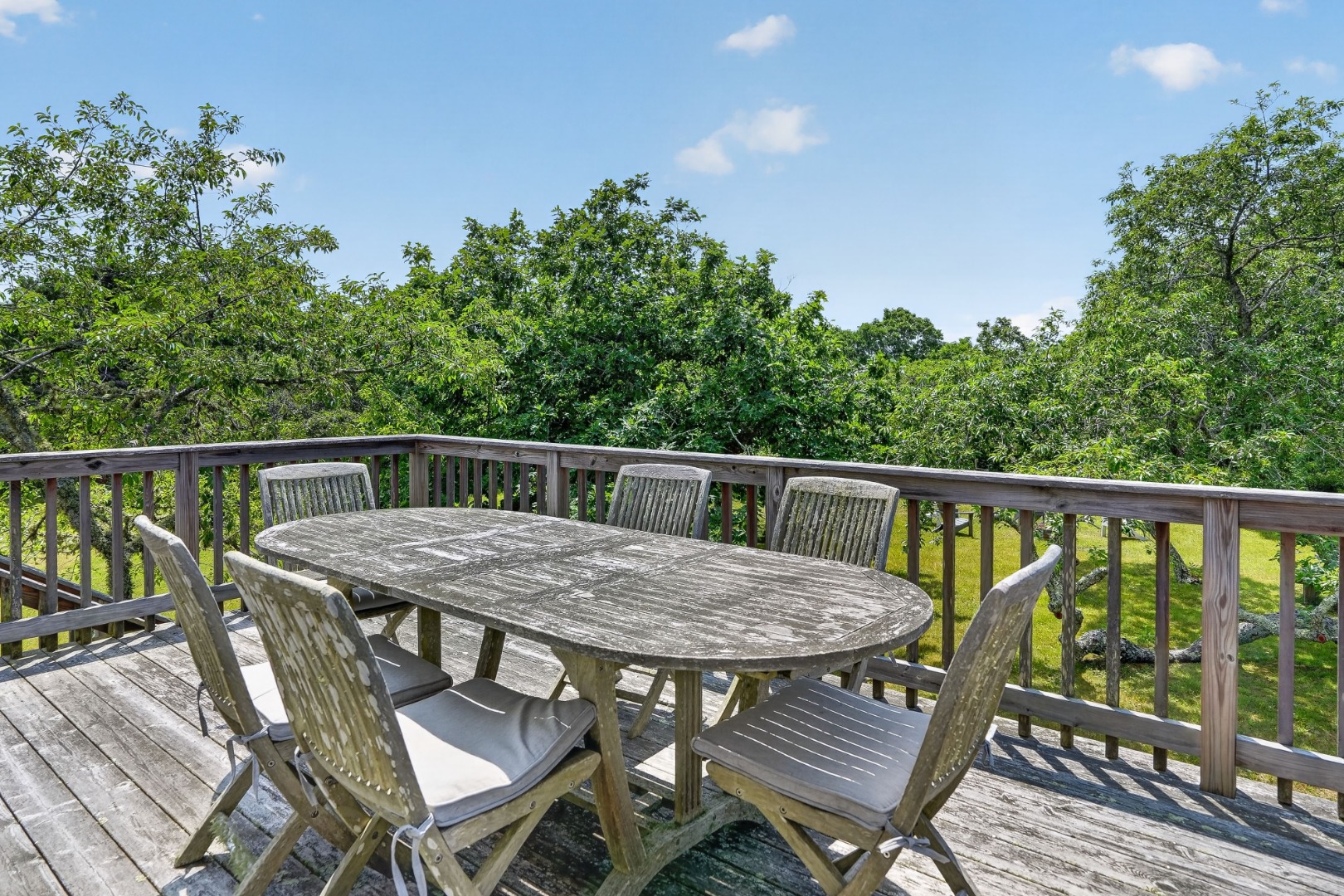 28 Black Point Road Chilmark, MA 02535 - Photo 14 of 56 Elevated deck with stairs down to the yard.
