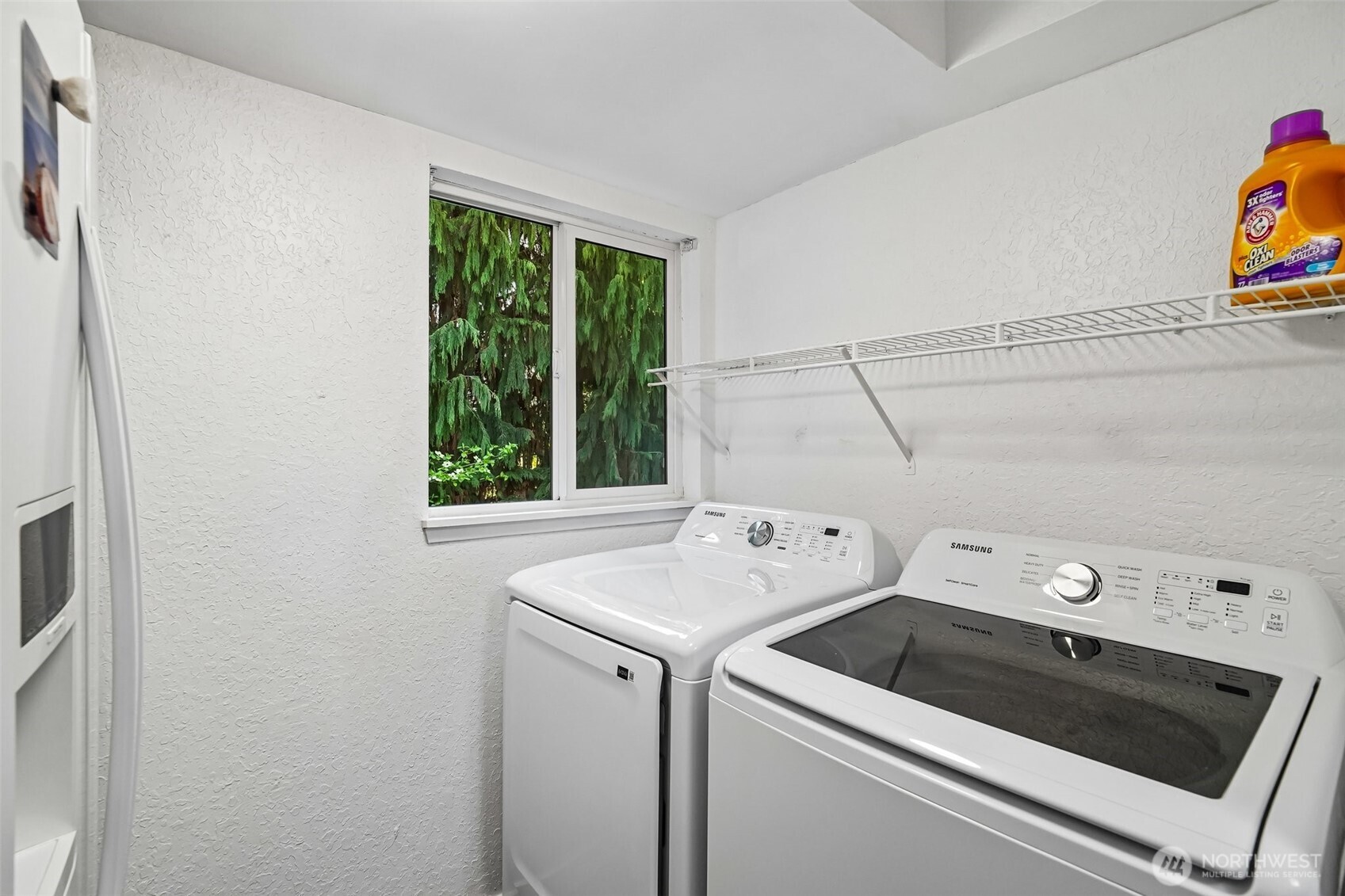 14401 Southeast Petrovitsky Road, Unit D205 Renton, WA 98058 - Photo 12 of 32 a utility room with dryer and washer