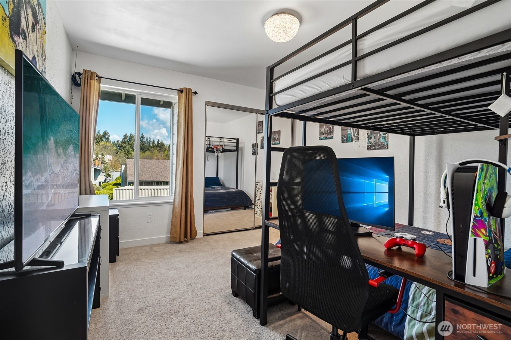 14401 Southeast Petrovitsky Road, Unit D205 Renton, WA 98058 - Photo 21 of 32 a view of a room with gym equipment