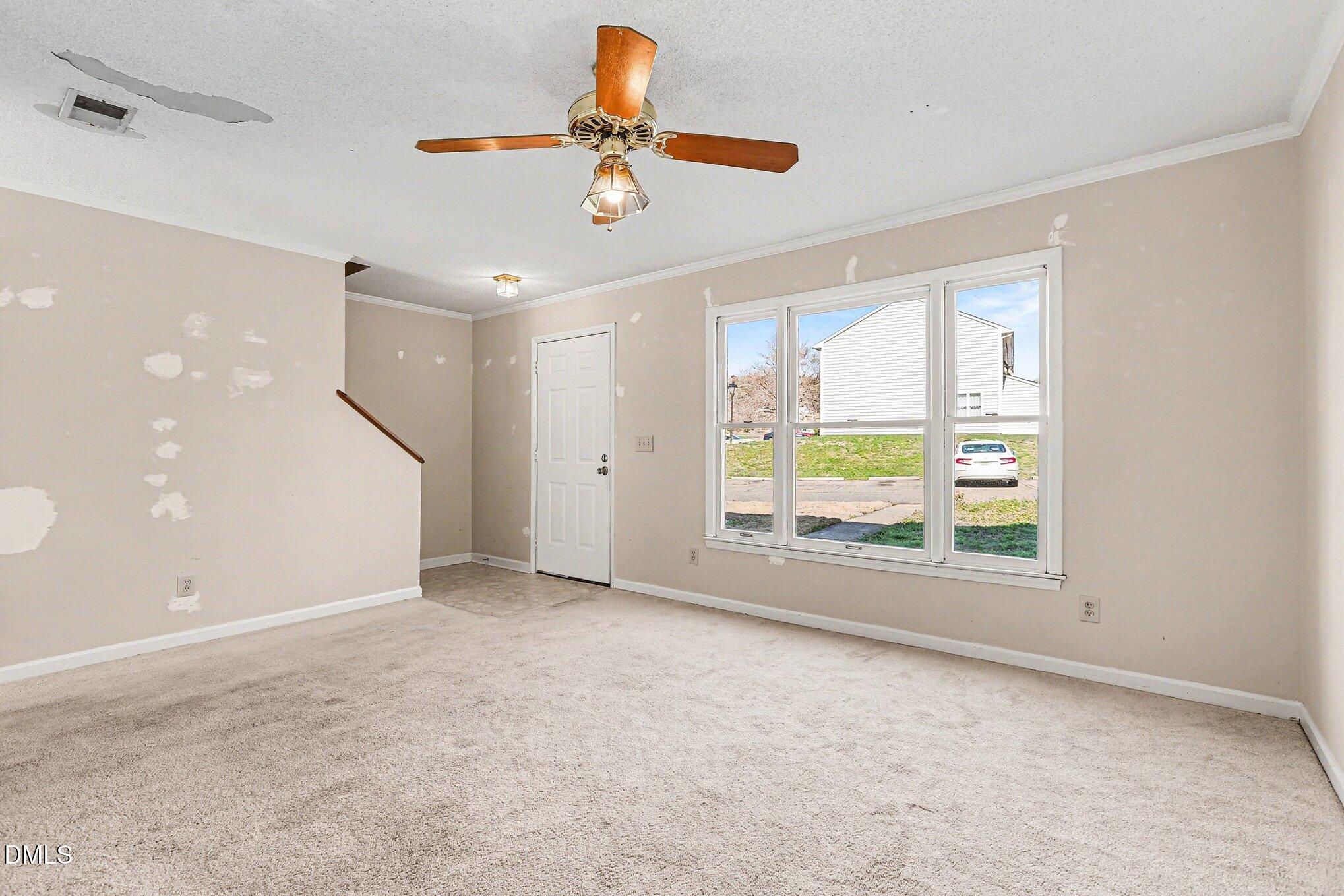 1812 Orange Grove Road, Unit 118 Hillsborough, NC 27278 - Photo 8 of 28 a view of an empty room with a window
