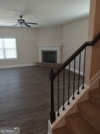 a view of entryway with wooden floor