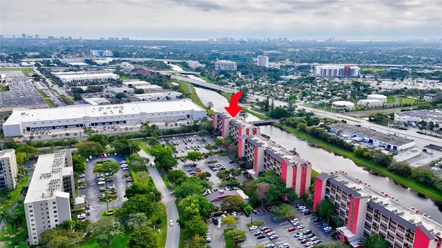 an aerial view of a houses with an outdoor space