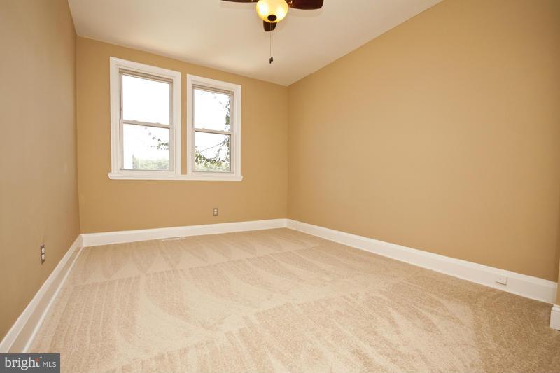 811 Wicklow Road Baltimore, MD 21229 - Photo 21 of 30 an empty room with a window