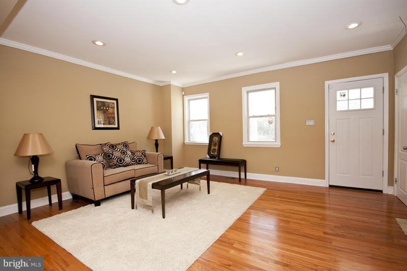 811 Wicklow Road Baltimore, MD 21229 - Photo 4 of 30 a living room with furniture and a wooden floor
