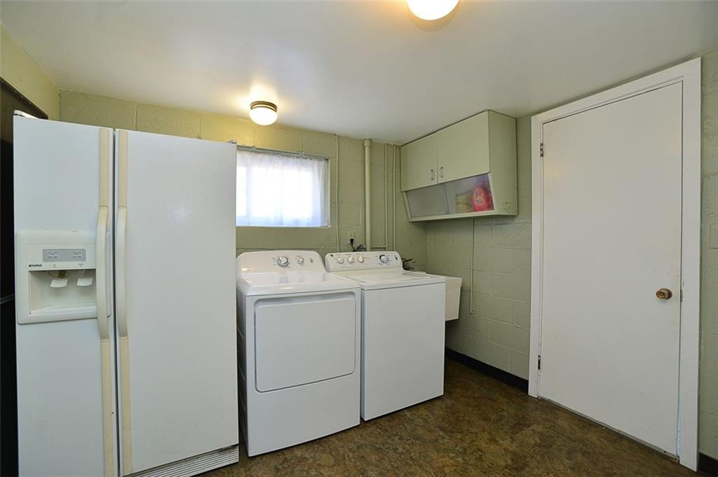 122 Easley Road Pittsburgh, PA 15237 - Photo 19 of 25 Separate 10x10 Laundry. Additional storage room opposite W/D could be a Kitchenette. Extra fridge included!