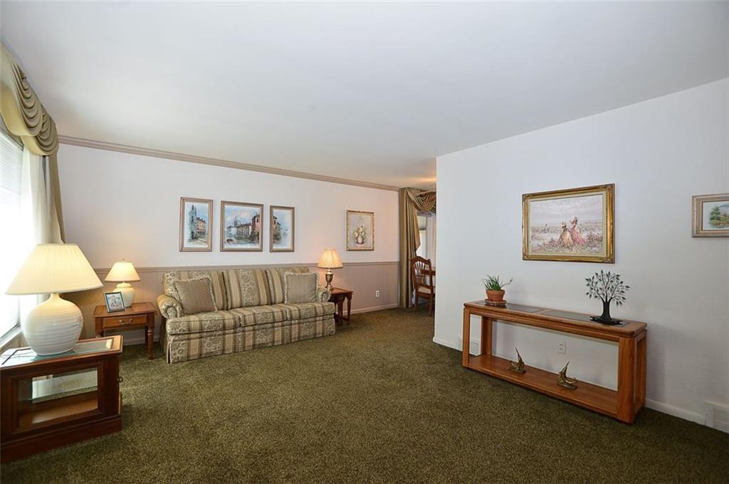 122 Easley Road Pittsburgh, PA 15237 - Photo 3 of 25 Newer carpeting with hardwood floors underneath.