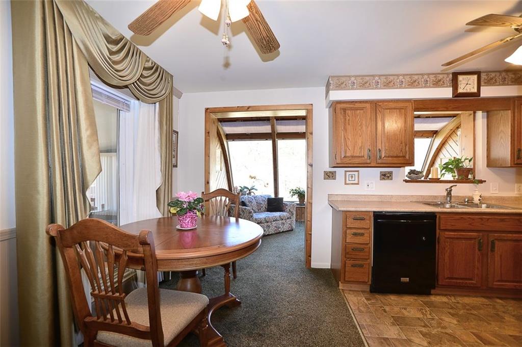 122 Easley Road Pittsburgh, PA 15237 - Photo 6 of 25 Eat-in Kitchen with ceiling fan and opening to Sun Room