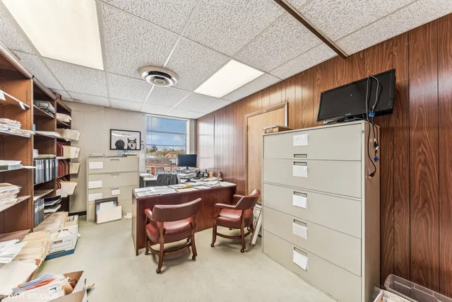 a room with furniture a washer and dryer