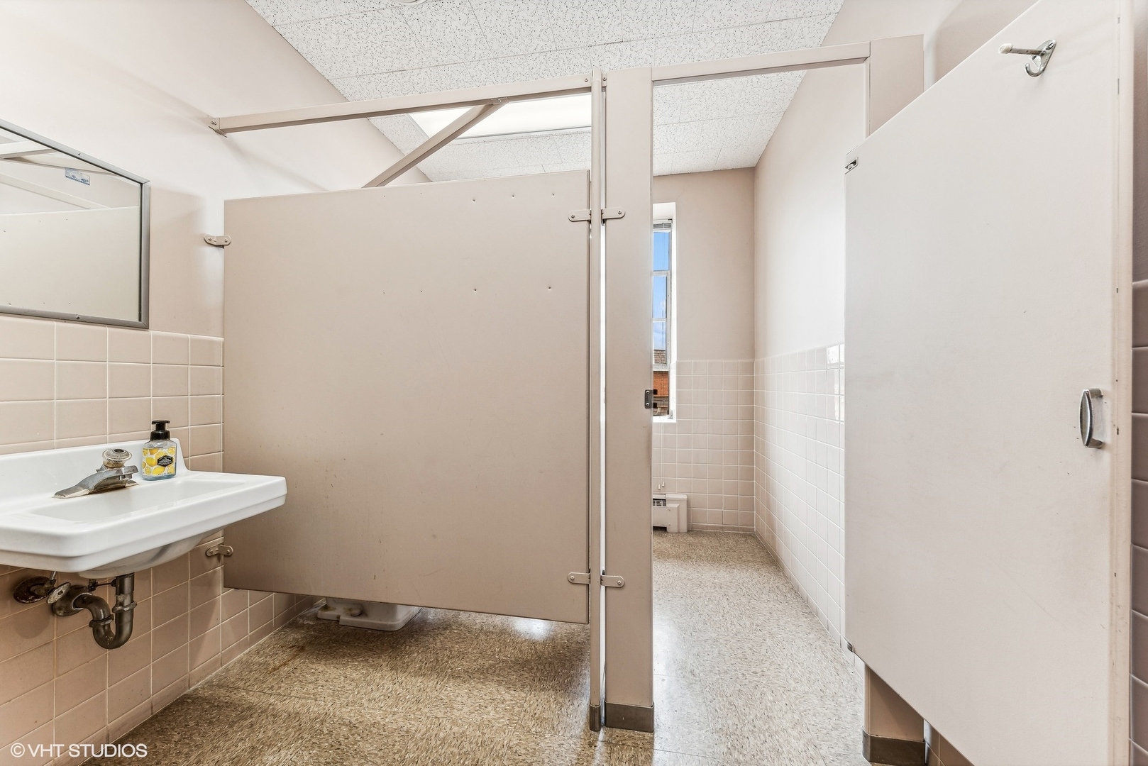 102 North Cook Street Barrington, IL 60010 - Photo 17 of 38 a bathroom with a sink a toilet and shower