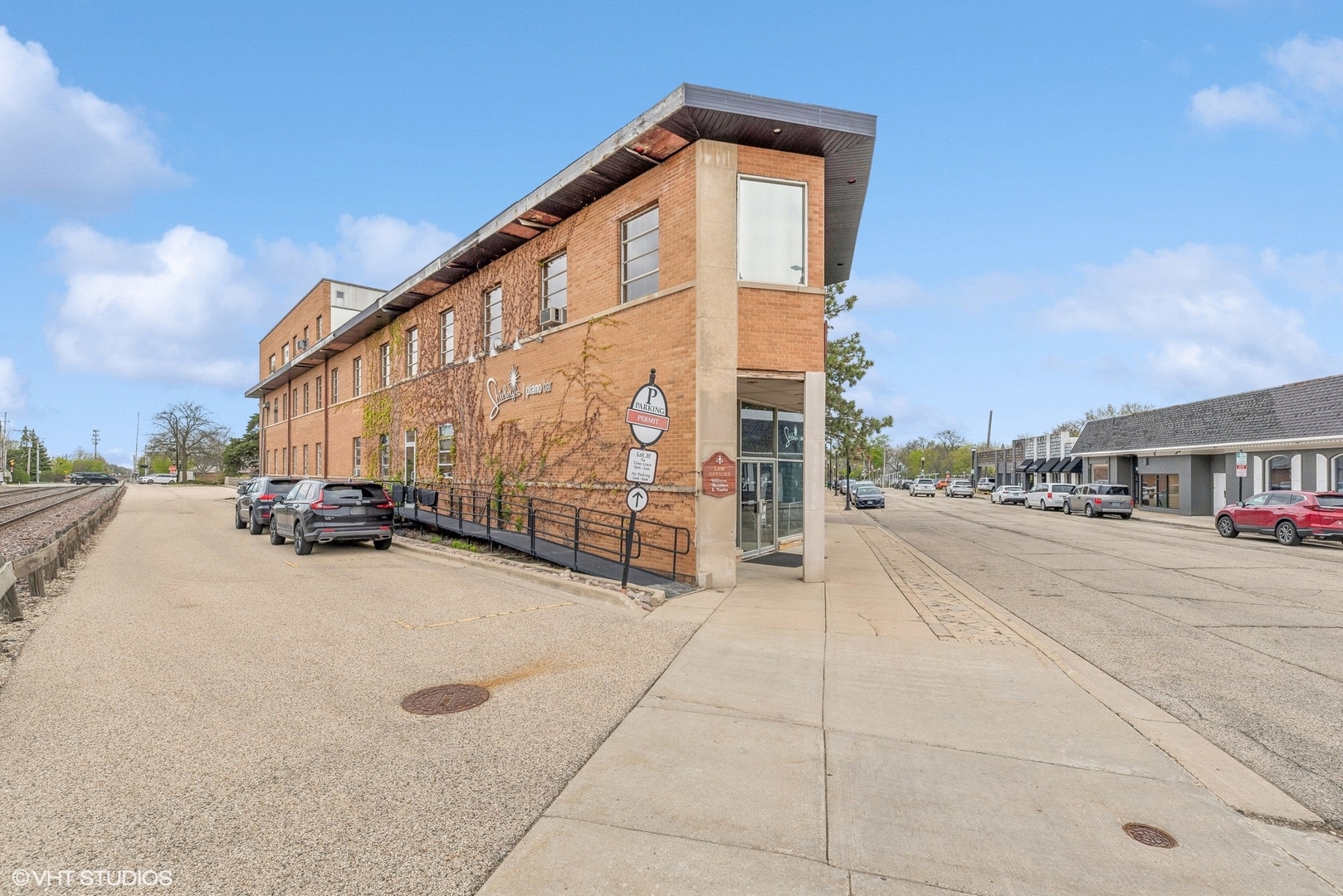 102 North Cook Street Barrington, IL 60010 - Photo 2 of 38 a view of a street with a building