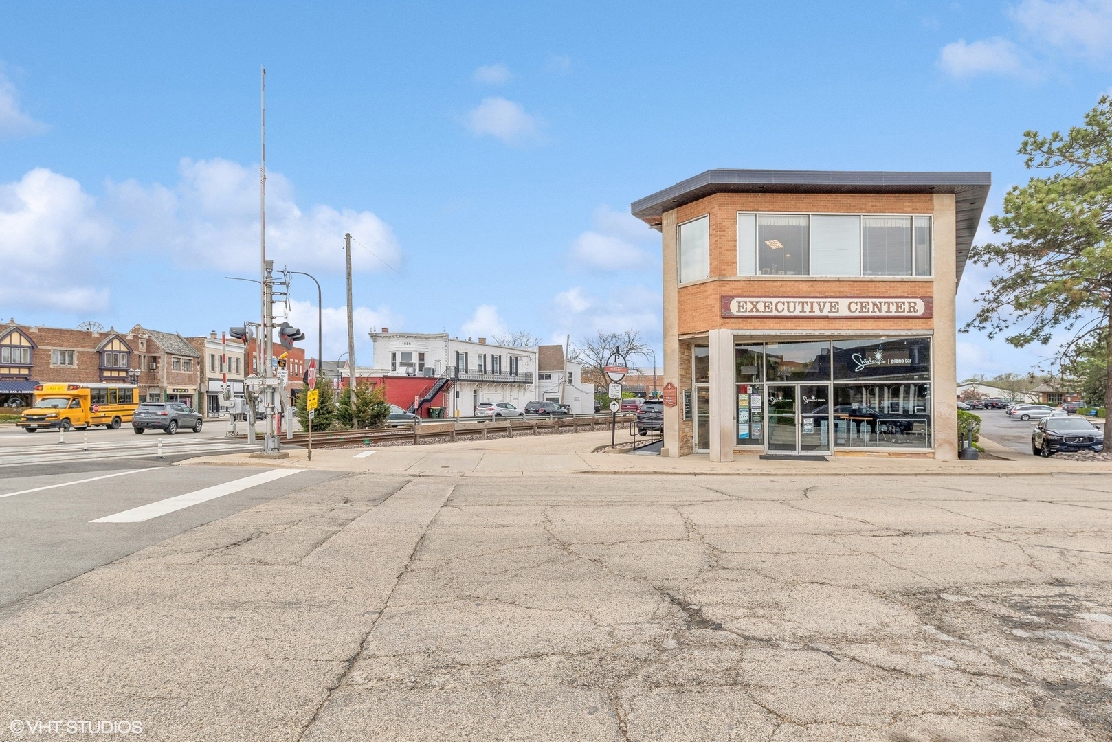 102 North Cook Street Barrington, IL 60010 - Photo 4 of 38 a view of a city street with a building