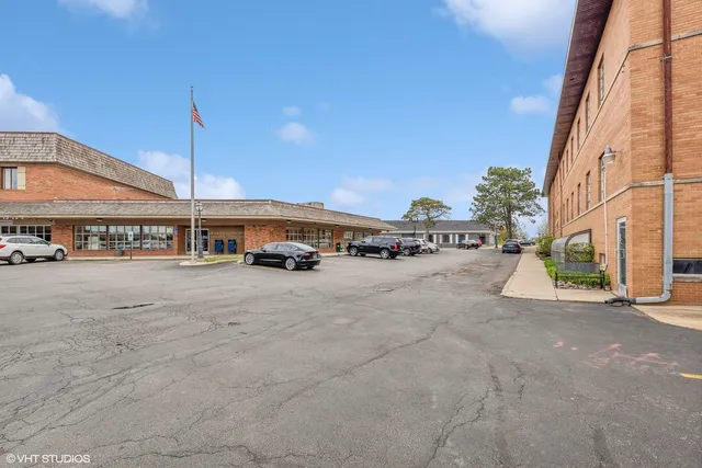 a view of a street with cars