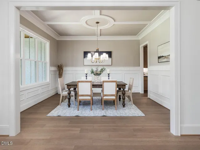 a view of a livingroom with entryway and stairs