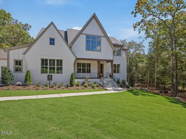a kitchen with stainless steel appliances a refrigerator and a stove