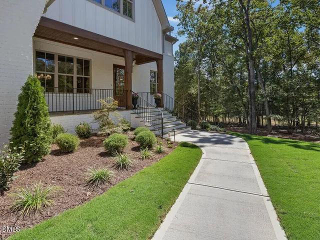 a view of balcony with furniture