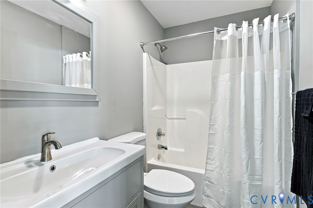 1626 Oak Ridge Road Appomattox, VA 24522 - Photo 22 of 30 Bathroom featuring a single vanity, integrated sin