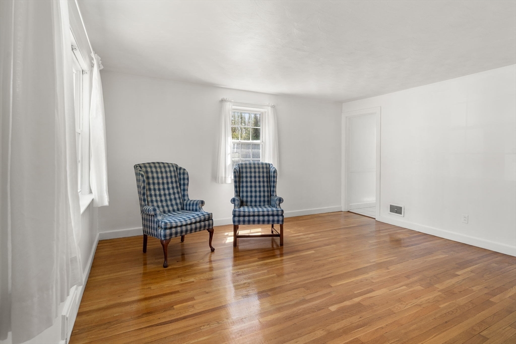 62 Felch Road Natick, MA 01760 - Photo 4 of 27 a view of empty room with wooden floor
